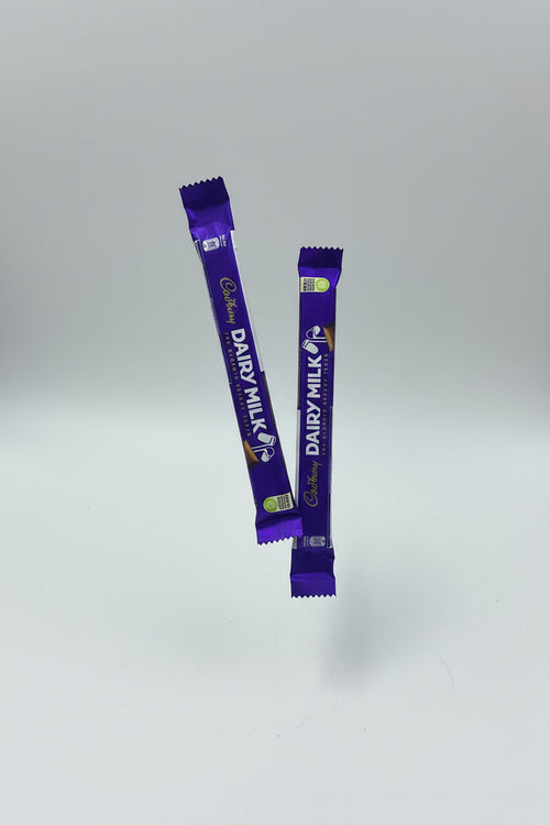 CADBURY DIARY MILK THE CLASSIC CREAMY TASTE 9 GM